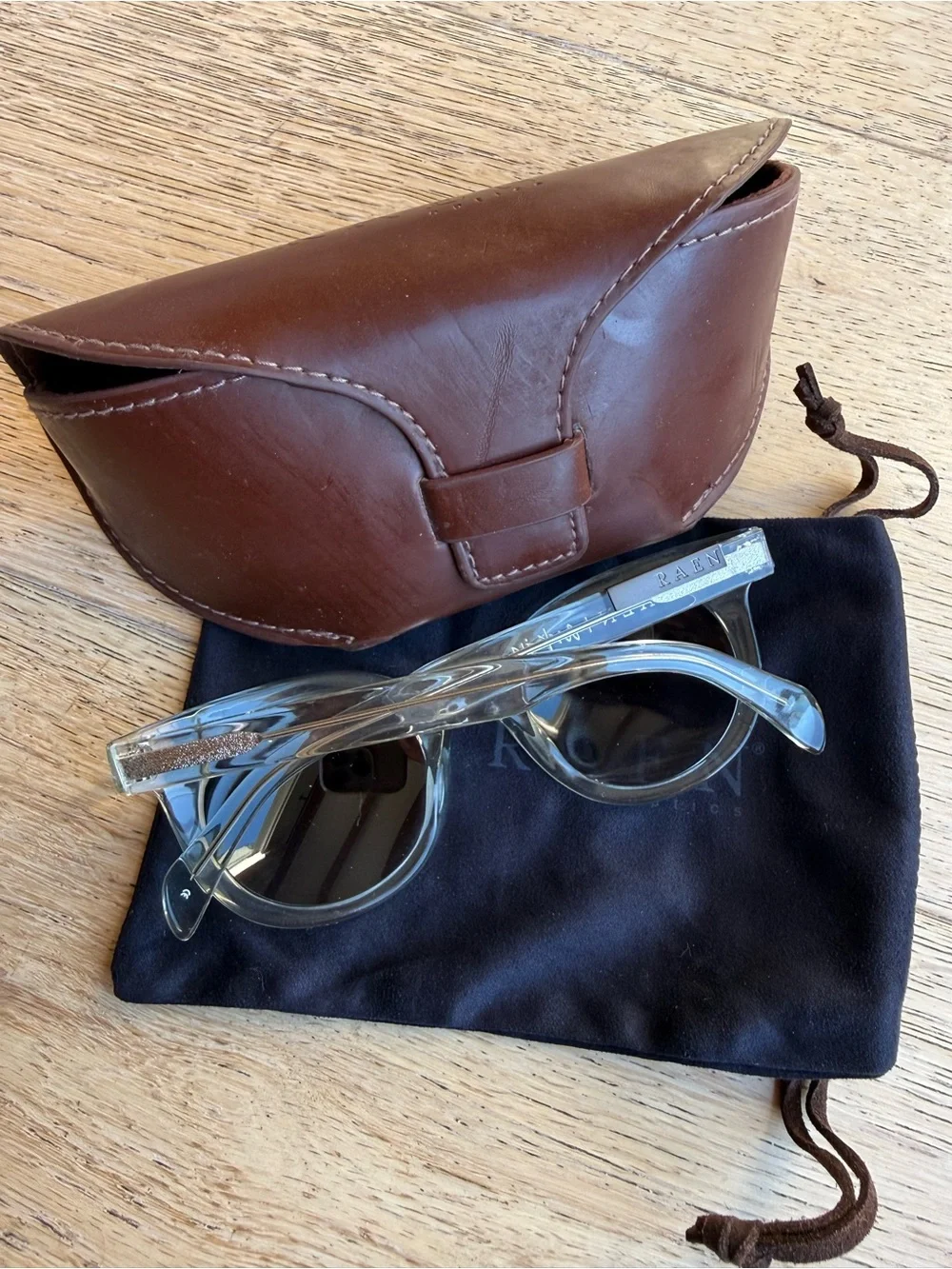 RAEN Clear Translucent Frame Sunglasses with Blue Gradient Lenses
